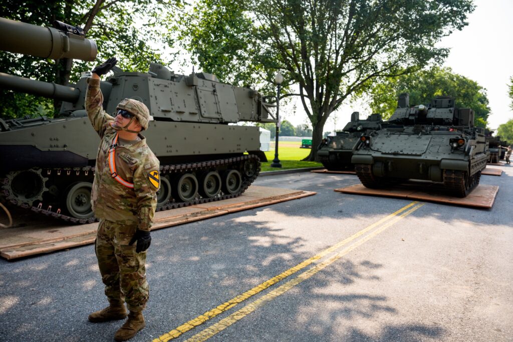 U.S. Army soldiers work on an assortment of M1 Alpha a3 Abrams tanks, stryker armored vehicles, and M2 Bradley fighting vehicles at West Potomac Park along the Potomac River on June 11, 2025 in Washington, D.C. Tanks and other heavy military equipment have arrived in the nation's capital for a military parade in honor of the U.S. Army's 250th anniversary, which coincides with President Donald Trump's birthday and Flag Day. (Photo by Andrew Harnik/Getty Images)