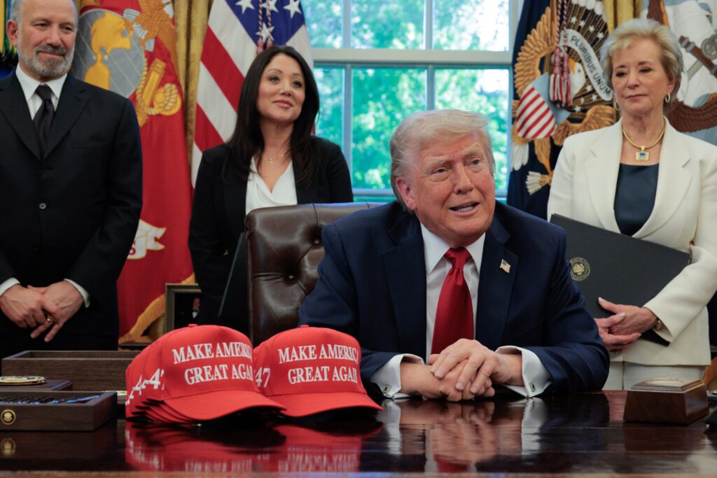 President Donald Trump speaks to the media as, left to right, Secretary of Commerce Howard Lutnick, Secretary of Labor Lori Chavez-DeRemer and Secretary of Education Linda McMahon look on after signing executive orders in the Oval Office at the White House on April 23, 2025 in Washington, D.C.  (Photo by Chip Somodevilla/Getty Images)