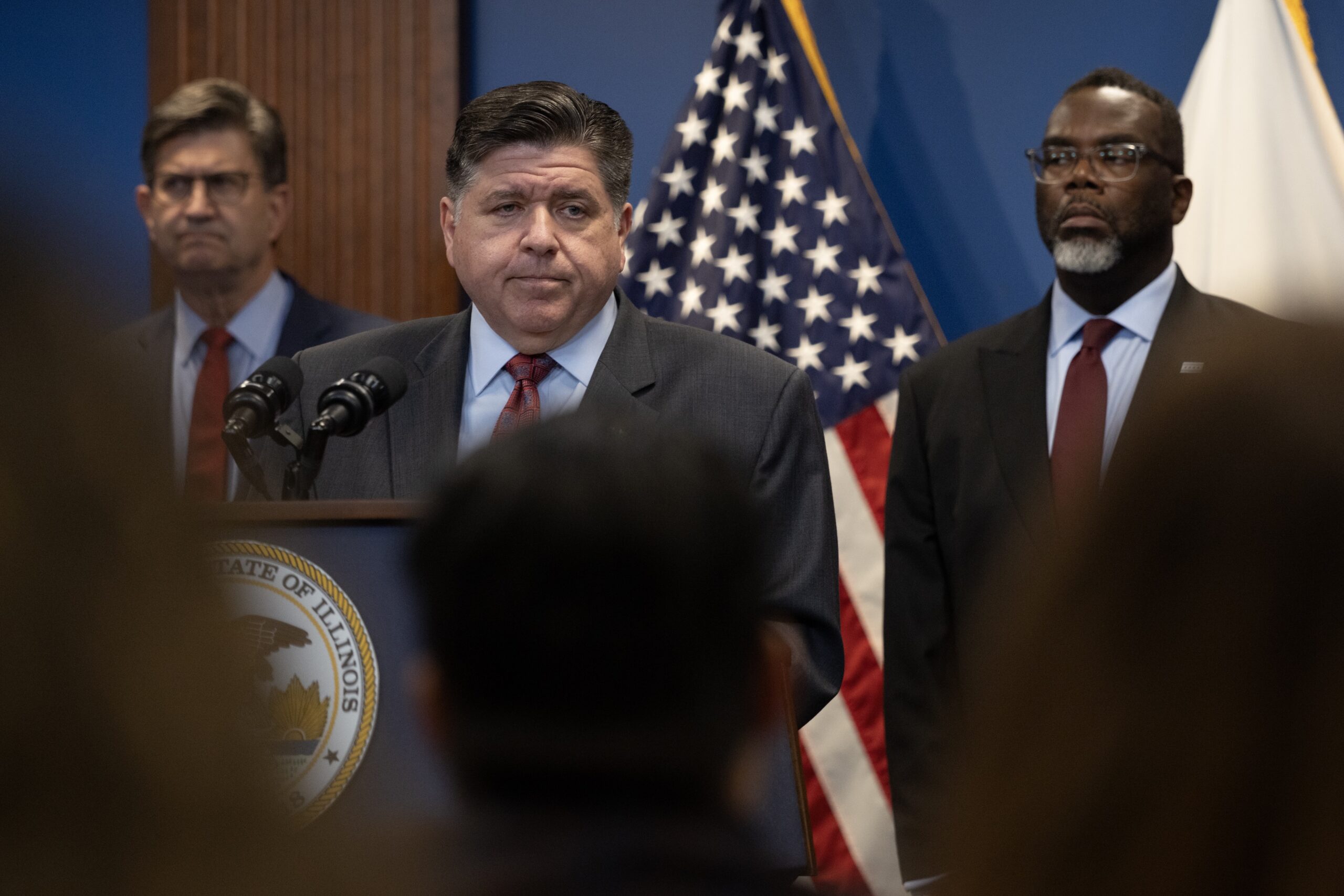 Illinois Gov. JB Pritzker speaks at a news conference in Chicago on Oct. 6, 2025. Chicago Mayor Brandon Johnson stands at right. (Scott Olson/Getty Images)
