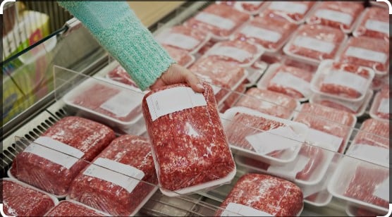 Ground beef in supermarket meat case