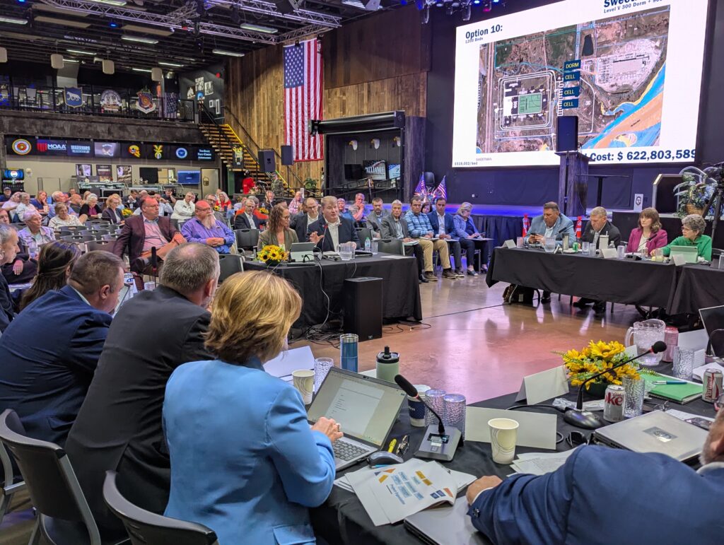 South Dakota State Engineer Stacy Watters, left, and Vance McMillan of JE Dunn testify to the Project Prison Reset task force on July 8, 2025, in Sioux Falls. (John Hult/South Dakota Searchlight)