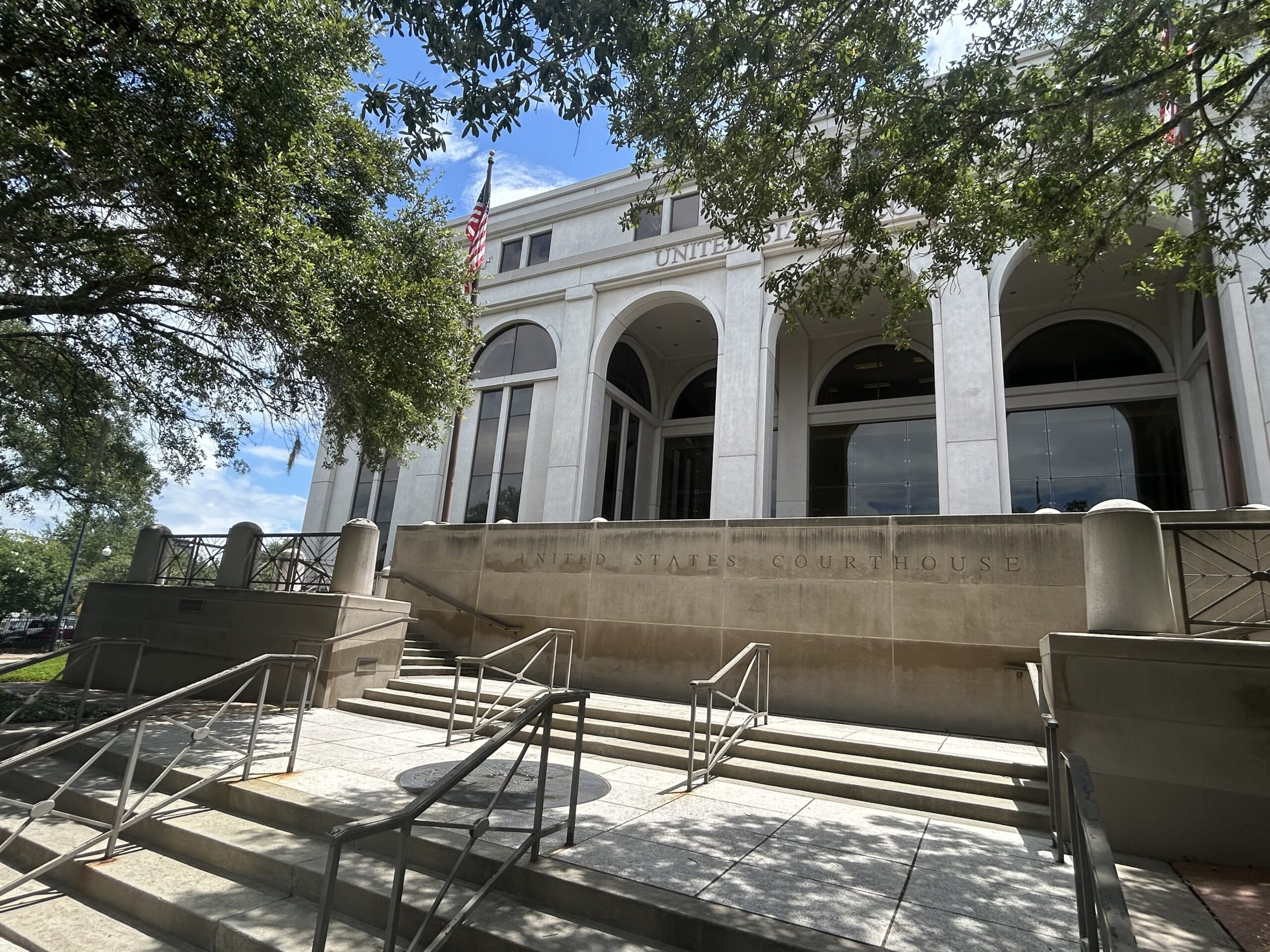 The Joseph Woodrow Hatchett United States Courthouse and Federal Building in downtown Tallahassee, Florida, where Deputy Attorney General Todd Blanche met on Thursday, July 24, 2025, with David O. Markus, lawyer for Ghislaine Maxwell. Maxwell, former girlfriend of late financier and Florida sex offender Jeffrey Epstein, is serving a 20-year sentence at a Tallahassee federal prison for conspiring with Epstein to sexually abuse girls. (Photo by Christine Sexton/Florida Phoenix) 