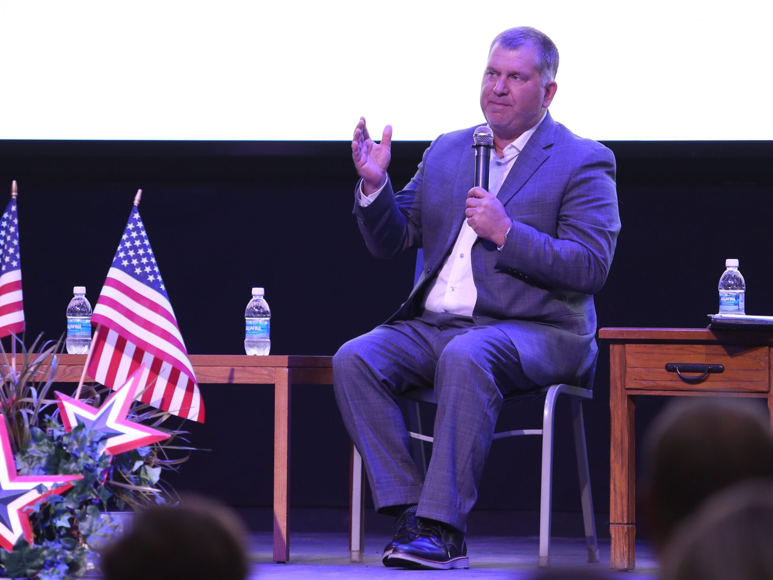 Tim Rave, president and CEO of South Dakota Association of Healthcare Organizations, speaks at a Downtown Sioux Falls Rotary meeting in July 2025. (Makenzie Huber/South Dakota Searchlight)