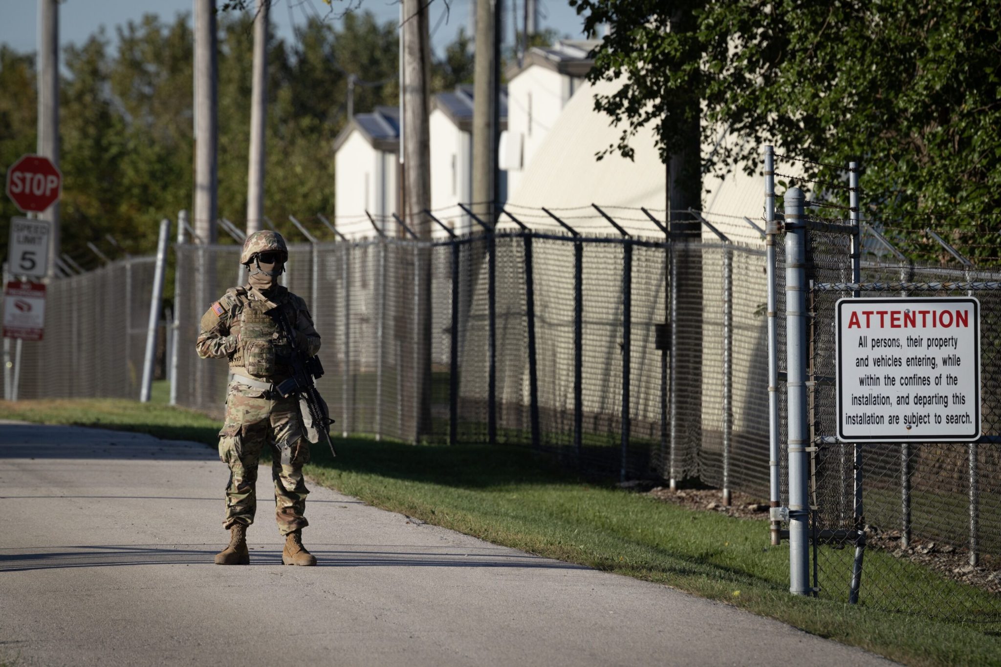 Members of the Texas National Guard stand guard at an army reserve training facility on October 07, 2025 in Elwood, Illinois. The Trump administration has been threatening for more than a month to send the guard to Illinois to address Chicago's crime problem and to support ICE and CBP during Operation Midway Blitz. Illinois Governor JB Pritzker has been outspoken in his opposition to the move, accusing the president of using the guardsmen as political pawns. (Photo by Scott Olson/Getty Images)