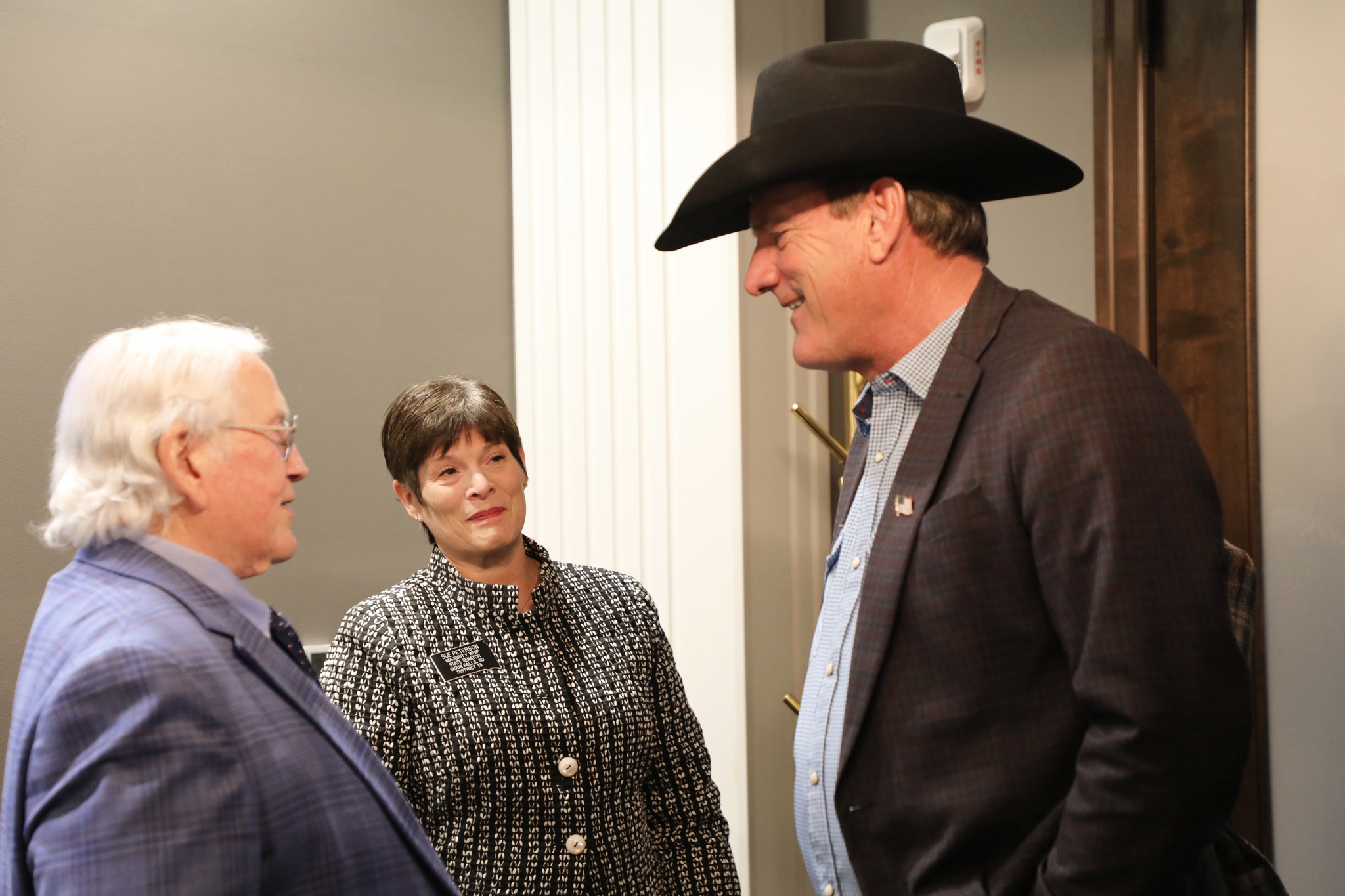 (Left to right) Mississippi Department of Corrections Commissioner Burl Cain, South Dakota State Sen. Sue Peterson, R-Sioux Falls, and South Dakota Gov. Larry Rhoden speak at a meeting in Sioux Falls in October 2025. (Photo courtesy of the South Dakota Governor's Office)