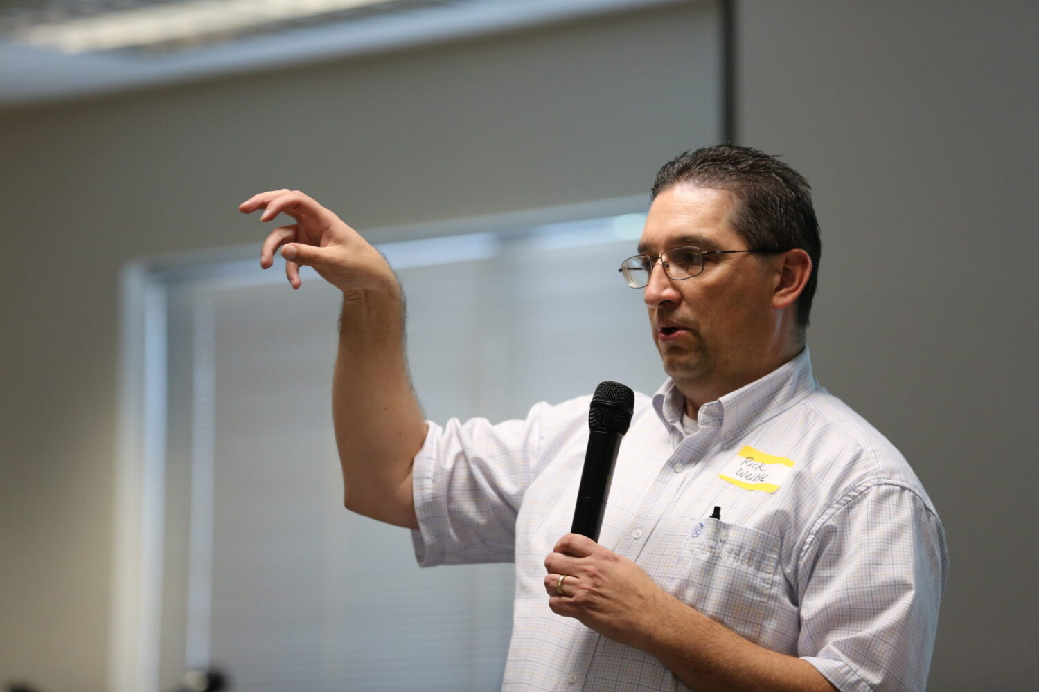 Rick Weible, who advocates for hand counting elections in South Dakota, briefs a crowd of fellow advocates in Sioux Falls on Nov. 14, 2025. (Photo by Joshua Haiar/South Dakota Searchlight)