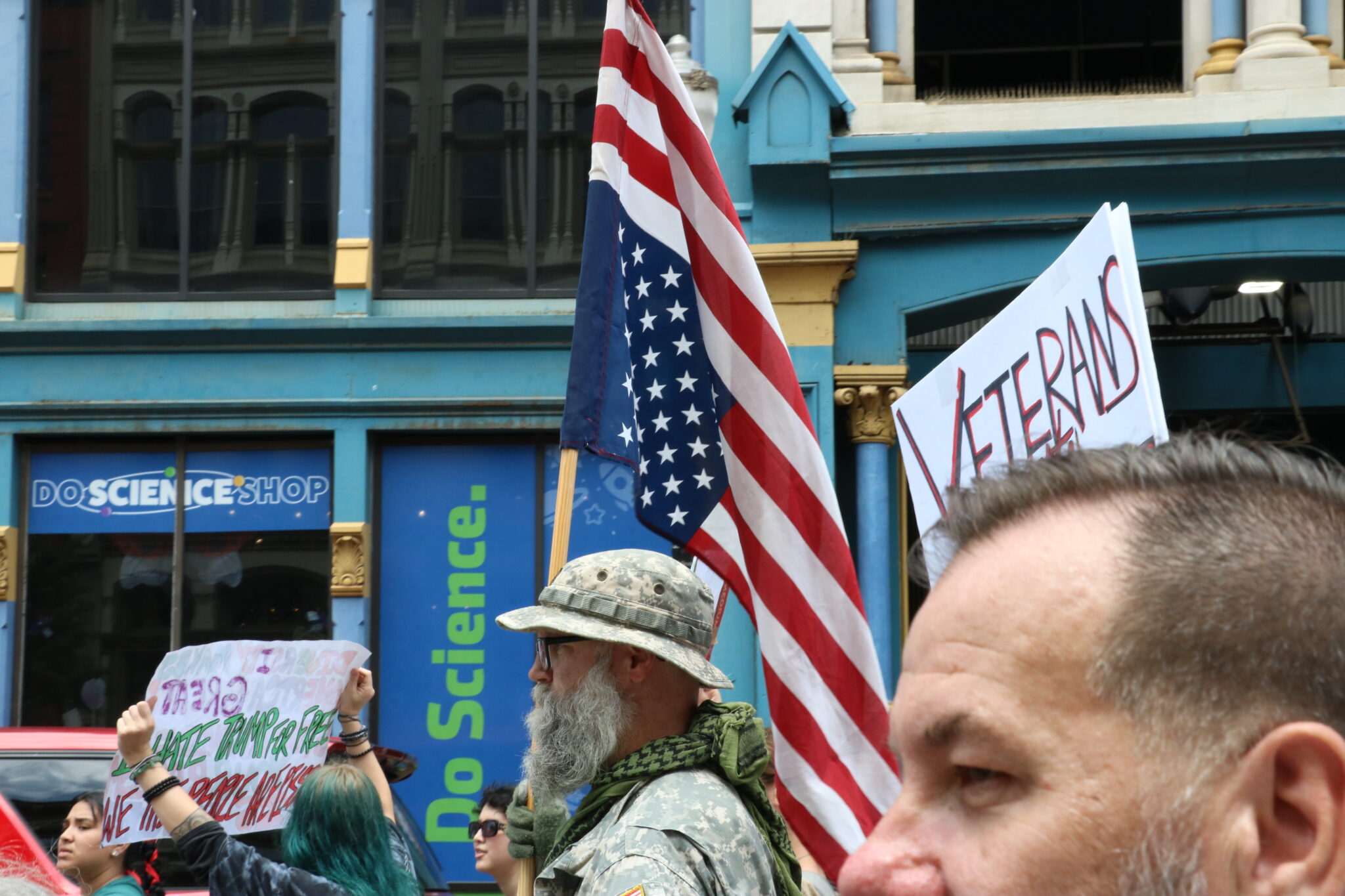 Andrew Schmidt, who said he is an Army veteran and a retired police officer from Hardin County, wears his Army field uniform while marching in downtown Louisville, Kentucky, as part of No Kings Day demonstrations on Saturday, June 14, 2025.