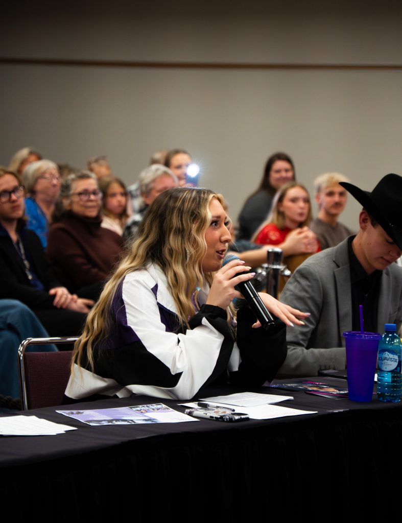 Pictured is Bijou Belle giving a young performer vocal feedback. Photo by Ethan Huntley
