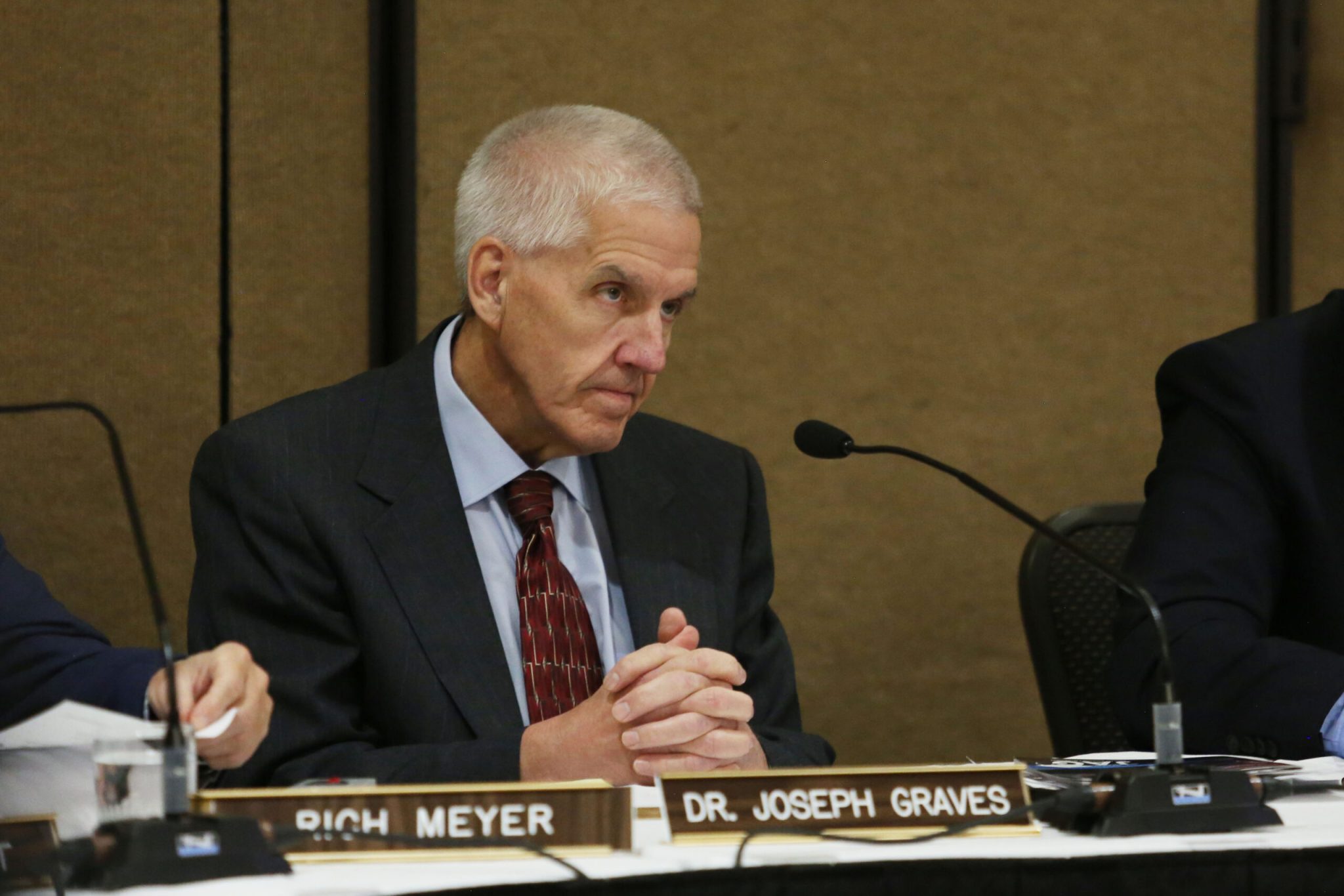 South Dakota Department of Education Secretary Joseph Graves listens to testimony at the state Board of Education Standards meeting in Sioux Falls on Nov. 10, 2025. (Photo by Makenzie Huber/South Dakota Searchlight)