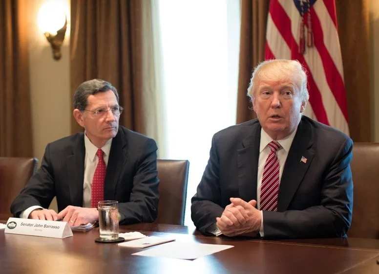 President Donald Trump, seated next to U.S. Sen. John Barrasso, R-Wyoming, meets with members of Congress on Feb. 14, 2018, in the Cabinet Room at the White House in Washington, D.C. (White House photo)