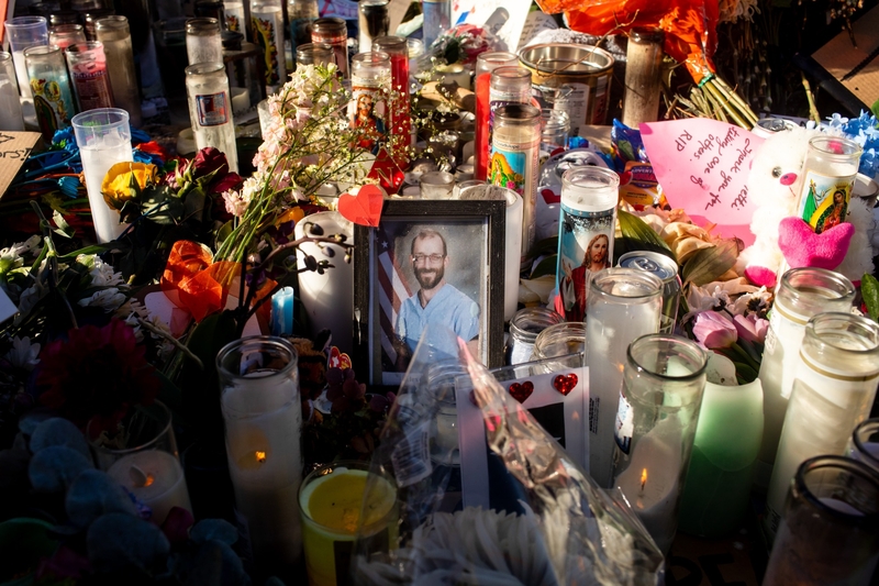 A growing memorial stands Wednesday, Jan. 28, 2026 where Alex Pretti, 37, was shot and killed by Border Patrol agents days before at Nicollet Avenue and 26th Street in Minneapolis. (Photo by Nicole Neri/Minnesota Reformer)