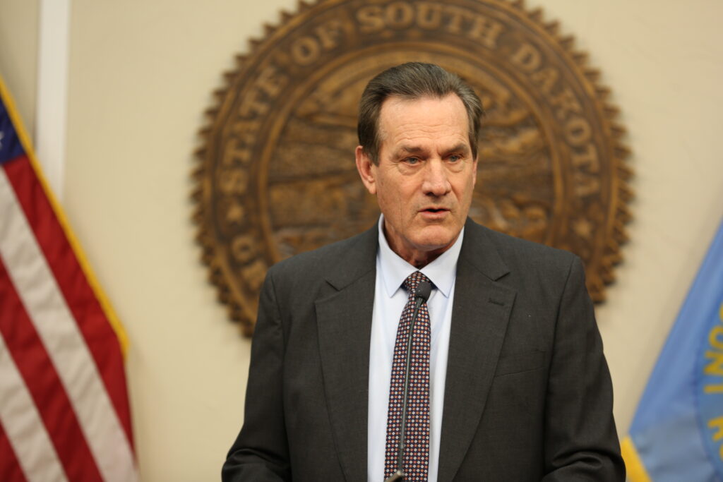 South Dakota Gov. Larry Rhoden speaks to the media during a press conference on March 13, 2025, at the Capitol in Pierre. (Joshua Haiar/South Dakota Searchlight)