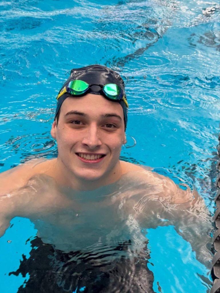 Owen Johnson celebrating a TYR Futures qualifying swim in the 100yd butterfly while at the 2026 Speedo Sectionals Championship (W.Fargo, ND)
