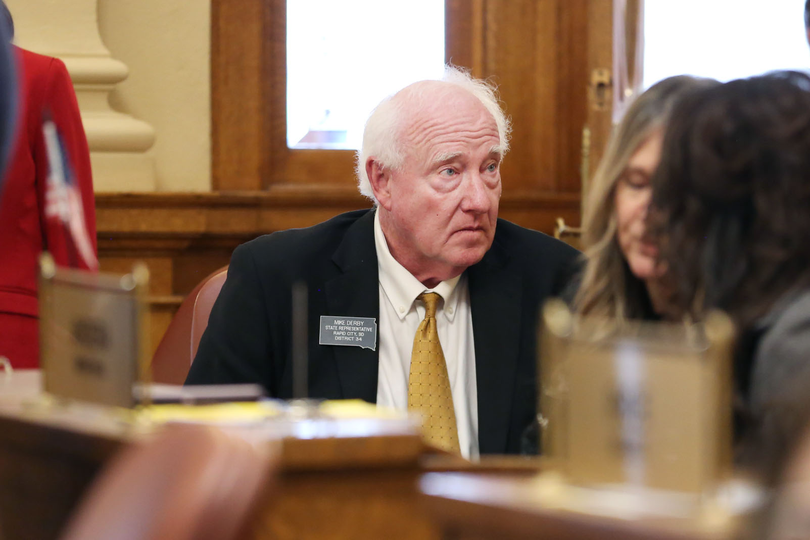 Rep. Mike Derby, R-Rapid City, speaks to other lawmakers at the governor's 2025 budget address on Dec. 2, 2025. (Makenzie Huber/South Dakota Searchlight)
