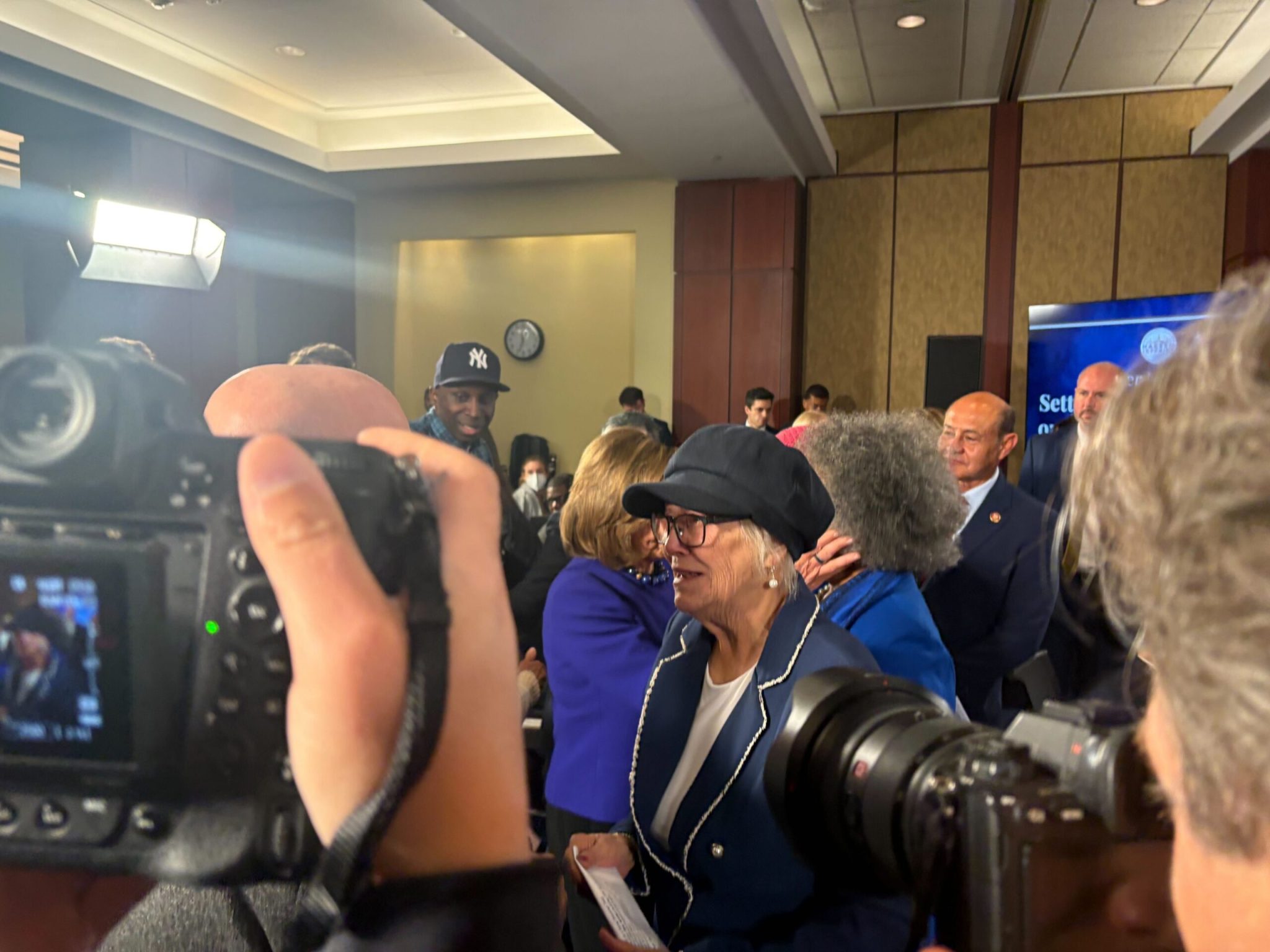 Idaho woman Pamela Hemphill greets spectators after testifying at a meeting held by U.S. House Democrats on the five-year anniversary of the Jan. 6 attack on the U.S. Capitol on Jan. 6, 2026. Hemphill participated in the riot and served two months in prison. She declined a pardon from Trump, saying she was guilty. (Photo by Jacob Fischler/States Newsroom)