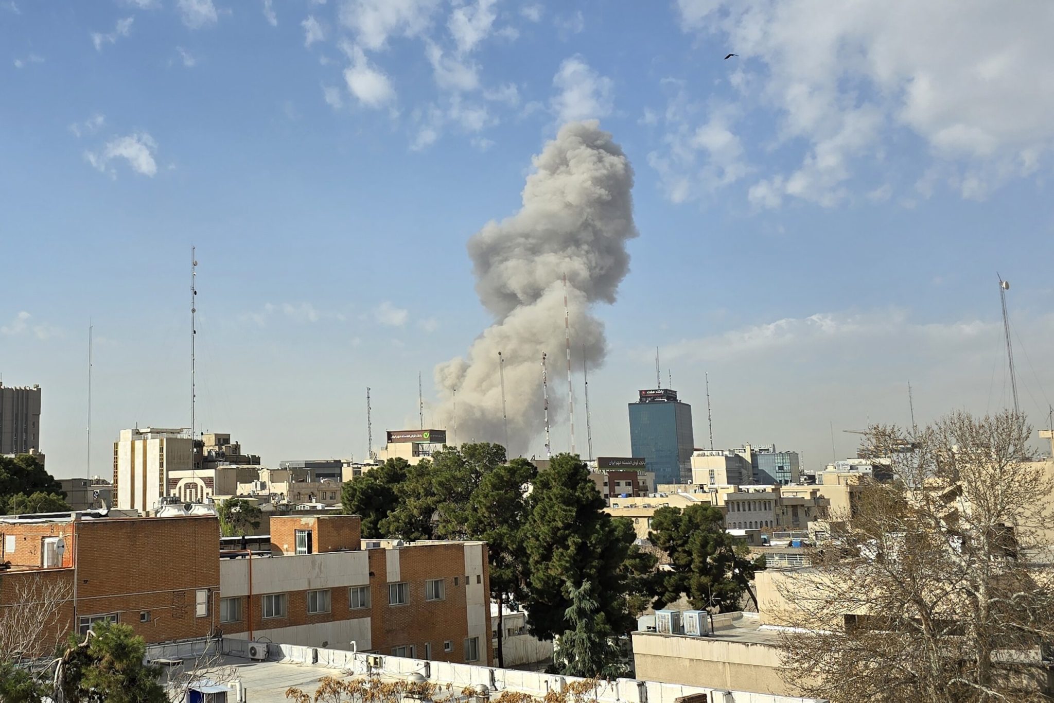 A plume of smoke rises after an explosion on February 28, 2026 in Tehran, Iran. (Photo by Getty Images)