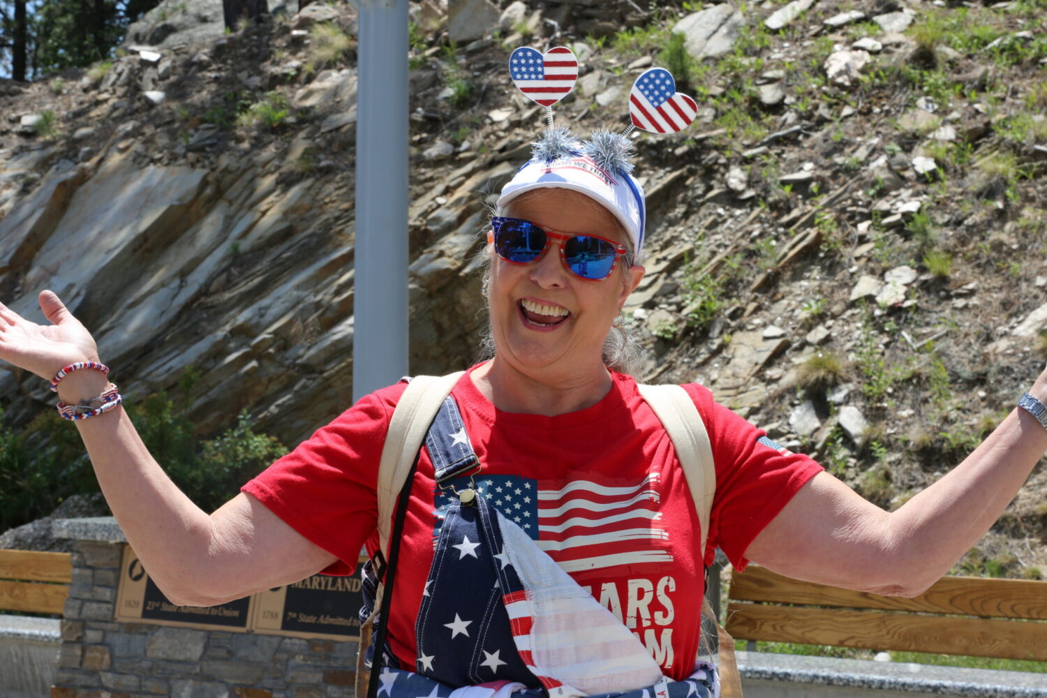 Leann Pearson, 67, of Fairfield, California, poses for a photo at South Dakota’s Freedom 250 Mount Rushmore Fireworks Celebration on July 3, 2026. (Photo by Meghan O'Brien/South Dakota Searchlight)
