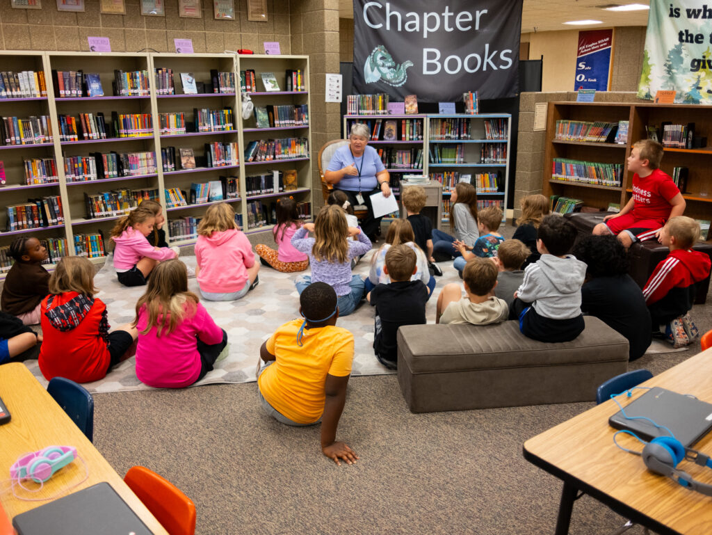 A Sioux Falls School District educator works with students at JFK Elementary School. (Courtesy of Sioux Falls School District)