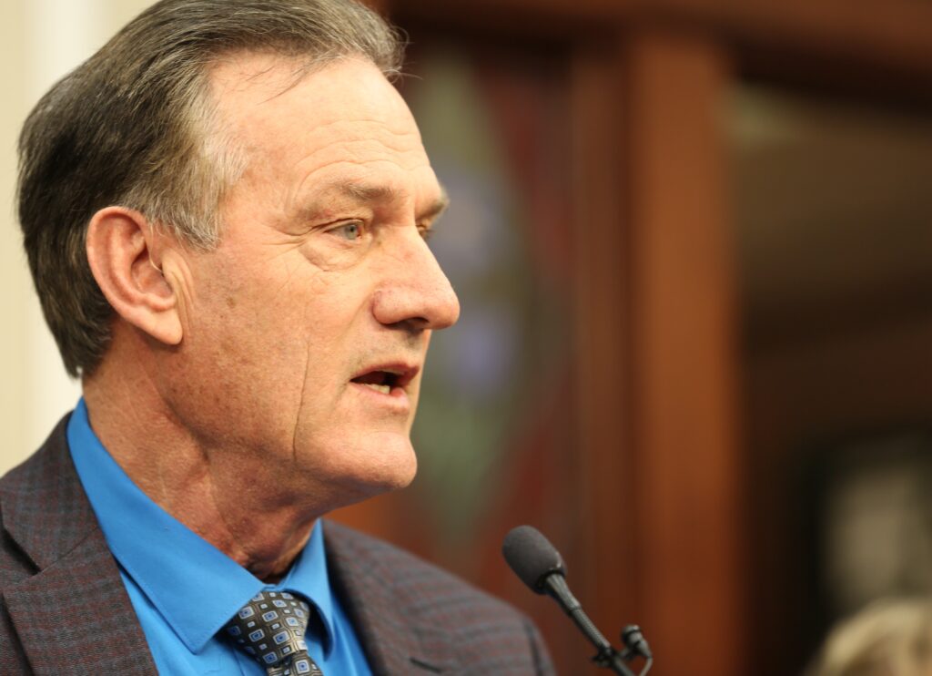 South Dakota Gov. Larry Rhoden speaks with the press at the Capitol in Pierre on Feb. 27, 2025. (Joshua Haiar/South Dakota Searchlight)