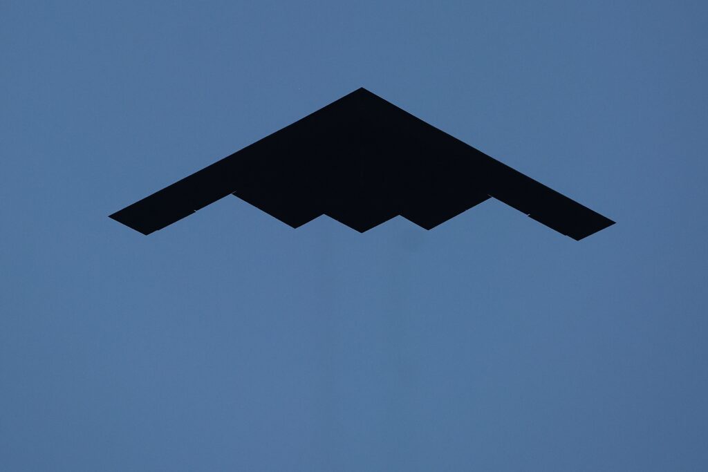 A B-2 Stealth Bomber performs a fly over before the NFL game between the Kansas City Chiefs and the Baltimore Ravens at GEHA Field at Arrowhead Stadium on Sept. 5, 2024 in Kansas City, Missouri. (Photo by Christian Petersen/Getty Images)