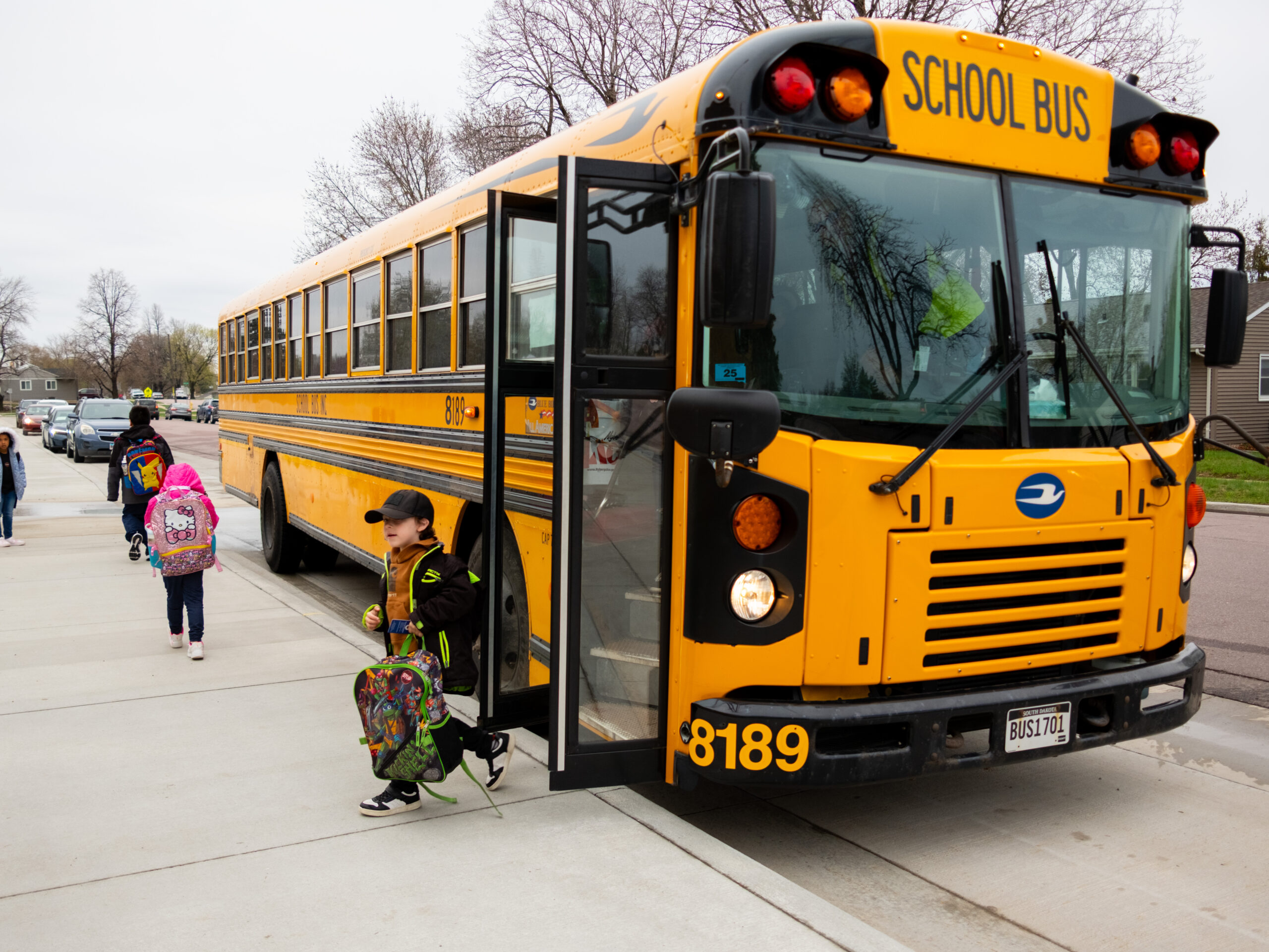 A Sioux Falls School District student gets off a bus. (Courtesy of Sioux Falls School District)