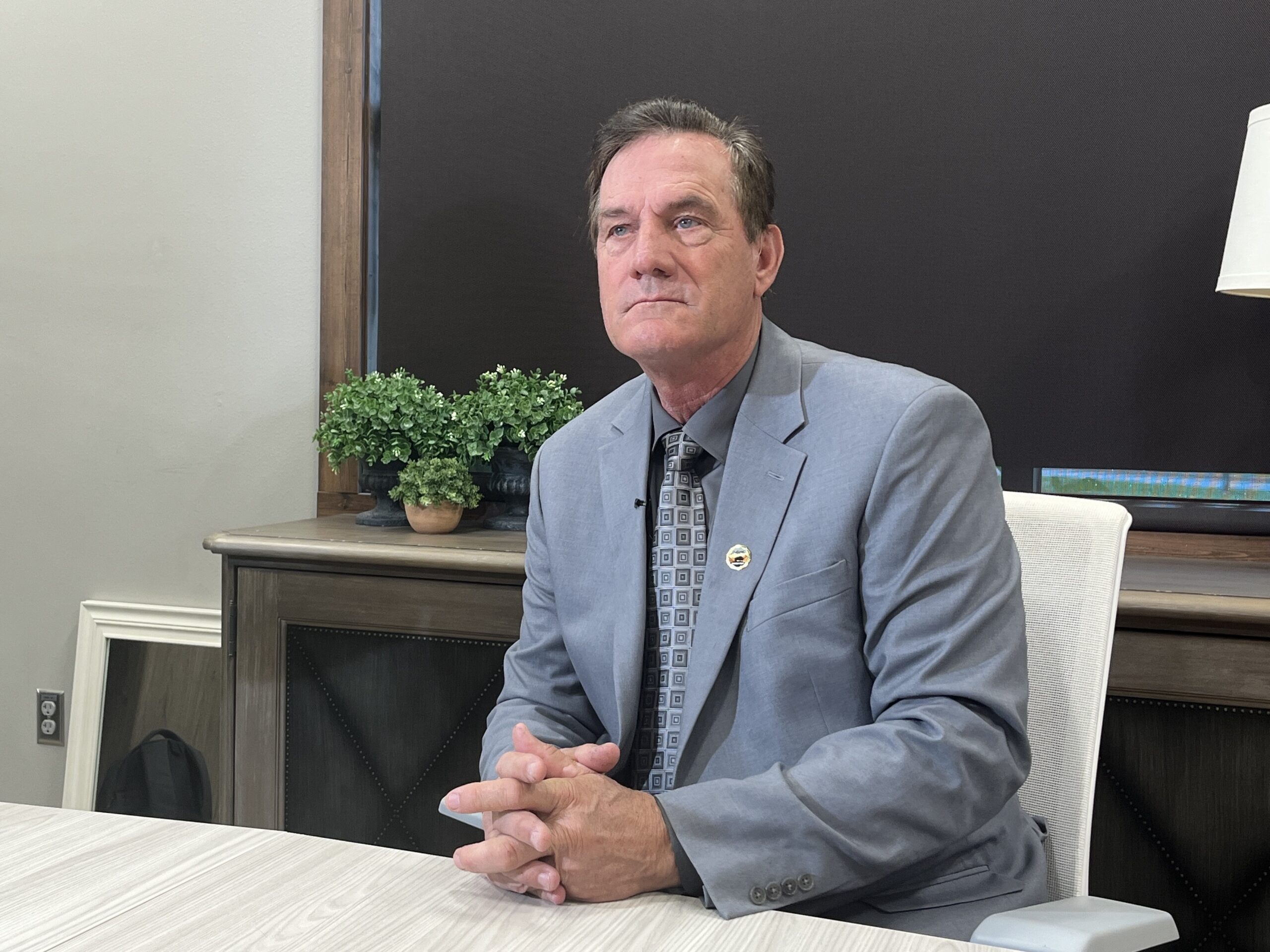 South Dakota Gov. Larry Rhoden speaks to media in Sioux Falls on Oct. 14, 2025. (Photo by Makenzie Huber/South Dakota Searchlight)