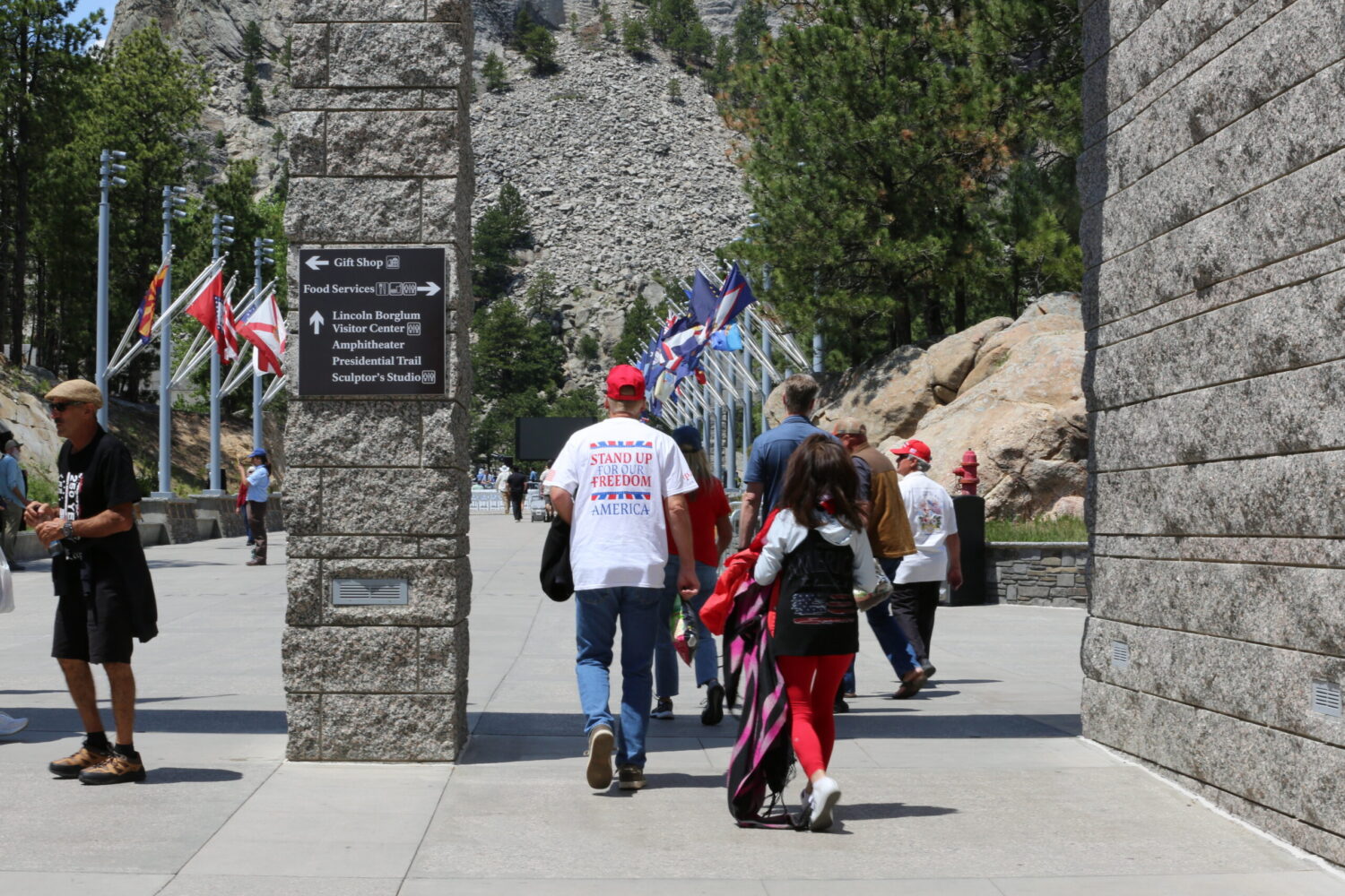 Attendees walk toward the amphitheater to get their seats for South Dakota’s Freedom 250 Mount Rushmore Fireworks Celebration on July 3, 2026. (Photo by Meghan O'Brien/South Dakota Searchlight)
