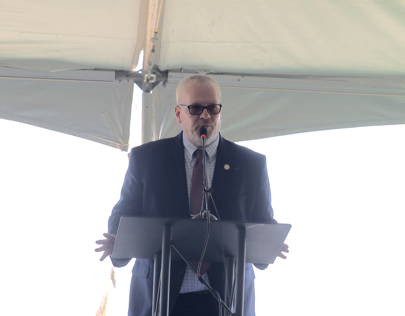South Dakota Department of Corrections Sec. Nick Lamb speaks prior to the groundbreaking for a new men's prison in Sioux Falls on April 22, 2026. (John Hult/South Dakota Searchlight)