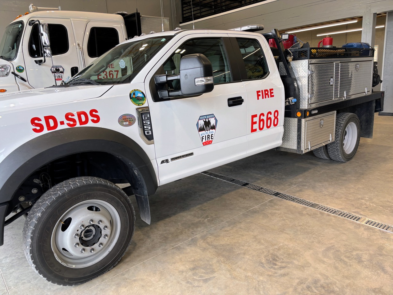 South Dakota Wildland Fire trucks are parked at the division's Rapid City location on April 20, 2026. (Photo by Seth Tupper/South Dakota Searchlight)