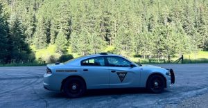 Highway Patrol car parked on road