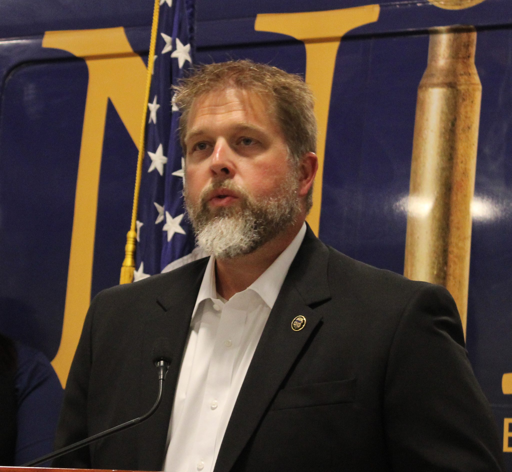 Spence Burnett, Assistant Special Agent in Charge for the Bureau of Alcohol, Tobacco, Firearms and Explosives, St. Paul Field Division, speaks on June 16, 2026 in Rapid City, SD (John Hult/South Dakota Searchlight)