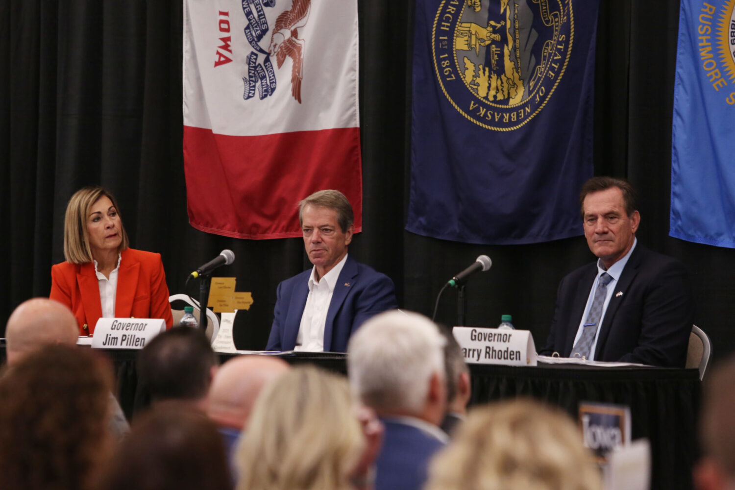 From left, Iowa's Kim Reynolds, Nebraska's Jim Pillen and South Dakota's Larry Rhoden participate in the Tri-State Governors' Conference in Dakota Dunes, South Dakota, on Aug. 26, 2025. (Photo by Makenzie Huber/South Dakota Searchlight)
