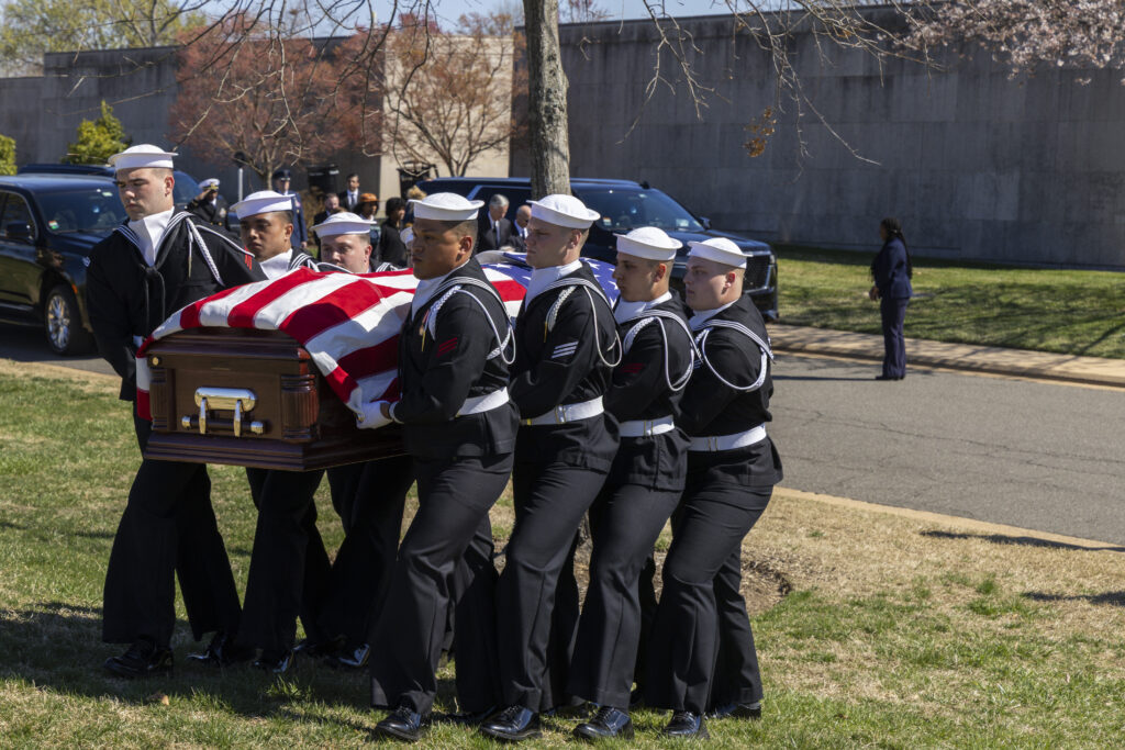 Sailors carry a casket with the remains of John Connolly at Arlington National Cemetery in March 2025. (Tracey Attlee/Special to the Georgia Recorder)