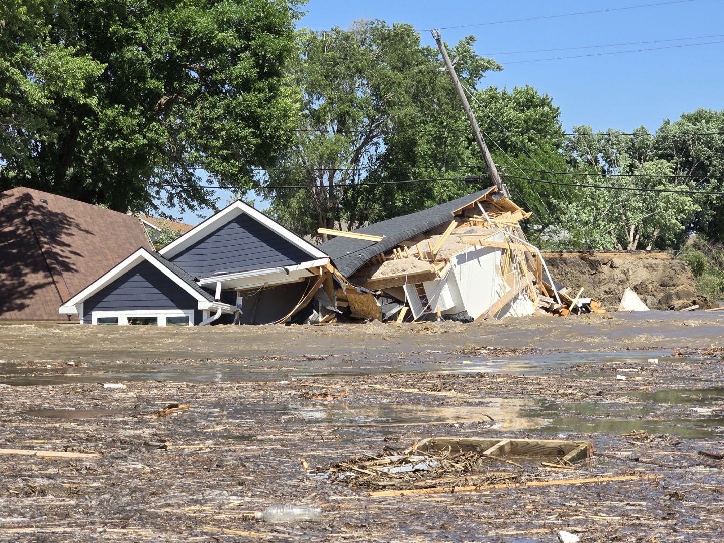 A June 24, 2024, view of a home destroyed by flooding the previous night at McCook Lake in southeast South Dakota. (Courtesy of Dirk Lohry)
