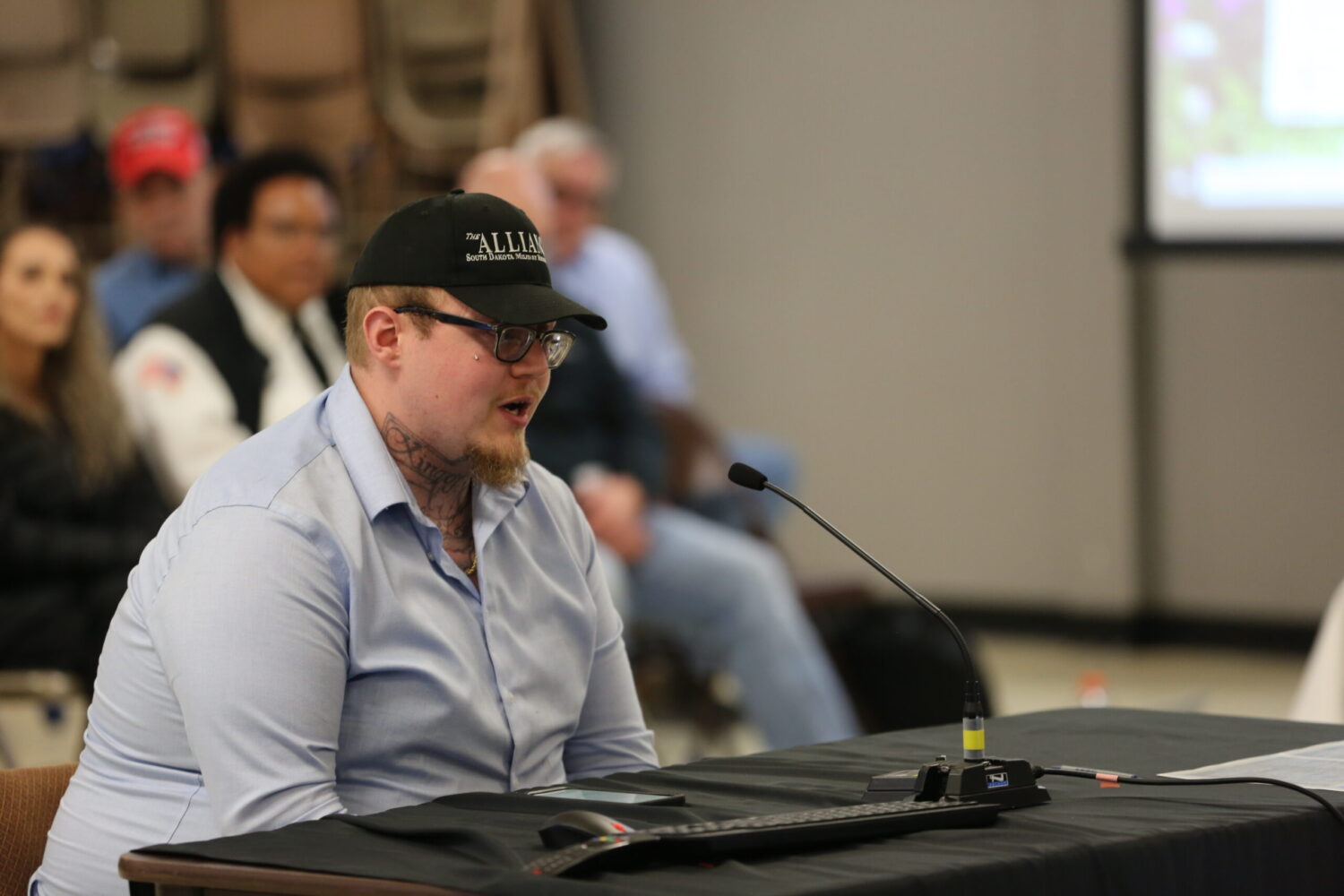 Former inmate Paul Cooper speaks at a Project Prison Reset meeting on April 29, 2025, in Springfield. (John Hult/South Dakota Searchlight)
