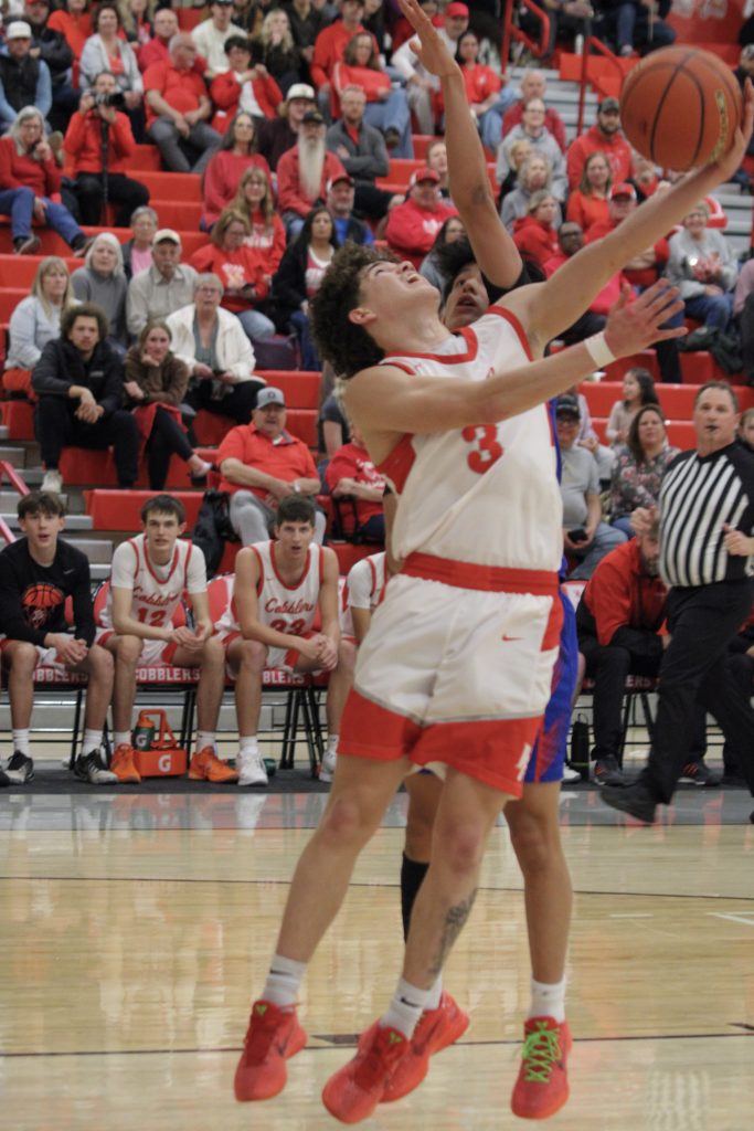 Jordan Yellow goes up for a layup during Central’s varsity game against Douglas, Photo by Andrea Albor