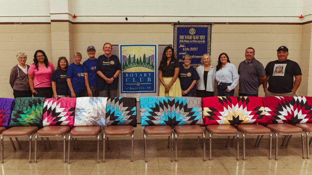 Members of the Rapid City Rotary Club and the leadership team from Friends of the Children He Sapa participated in the graduation ceremony/naming ceremony on August 5, 2026.
