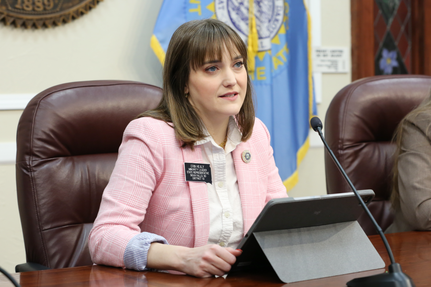 House Minority Leader Erin Healy, D-Sioux Falls, speaks to members of the press on March 6, 2025, at the Capitol in Pierre. (Makenzie Huber/South Dakota Searchlight)